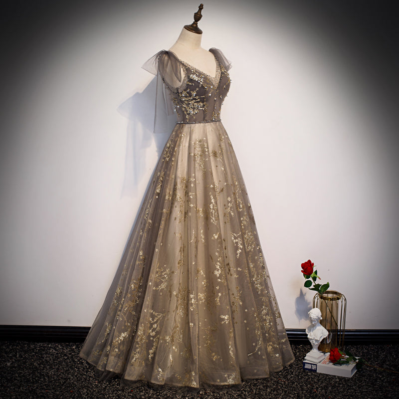 champagne prom dresses 2022 Champagne Elgant A-line Spaghetti Straps Backless Sequins Prom Dresses